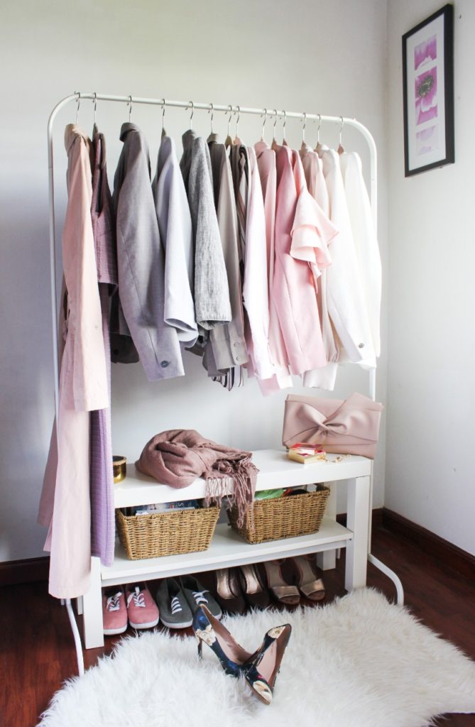 Use a colour palette for open closet in a small bedroom.