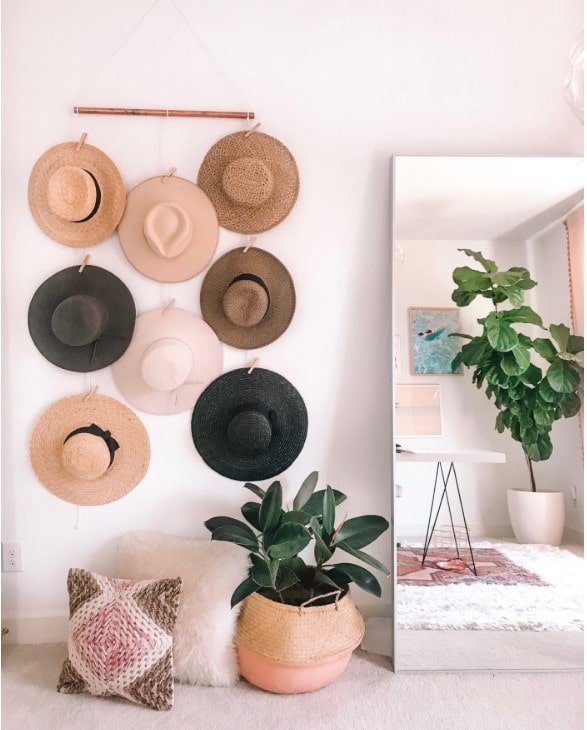 Another storage hack is to use your belongings as decor in a small bedroom.