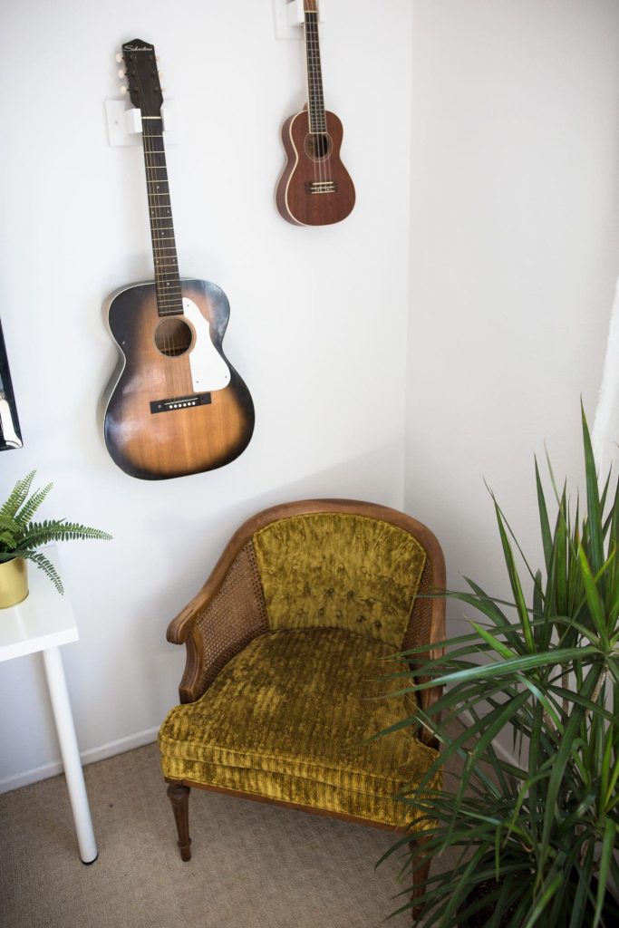 Another storage hack is to use your belongings as decor in a small bedroom.
