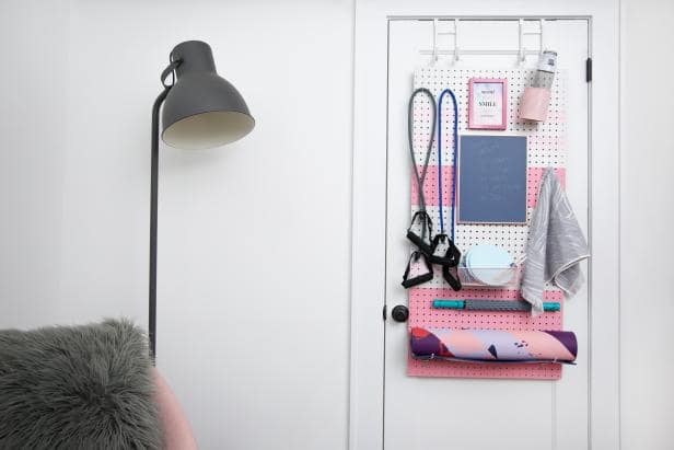 Your closet doors are goldmines for hidden storage to maximize space in a small bedroom