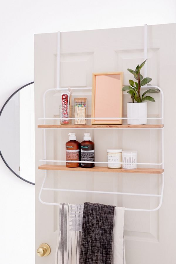 Over the door storage is a key way to maximize space in a small bedroom