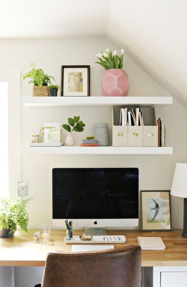 home office with styled floating shelves