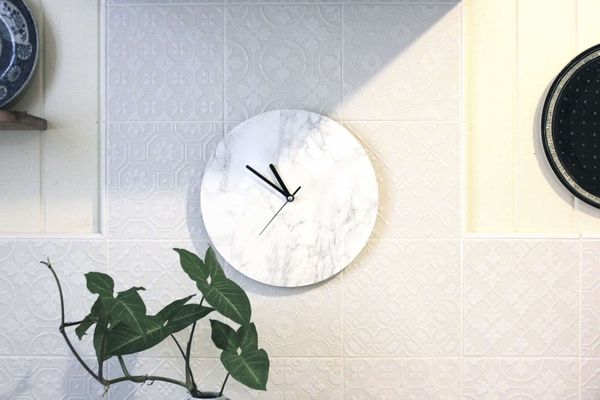 Clock with marble background