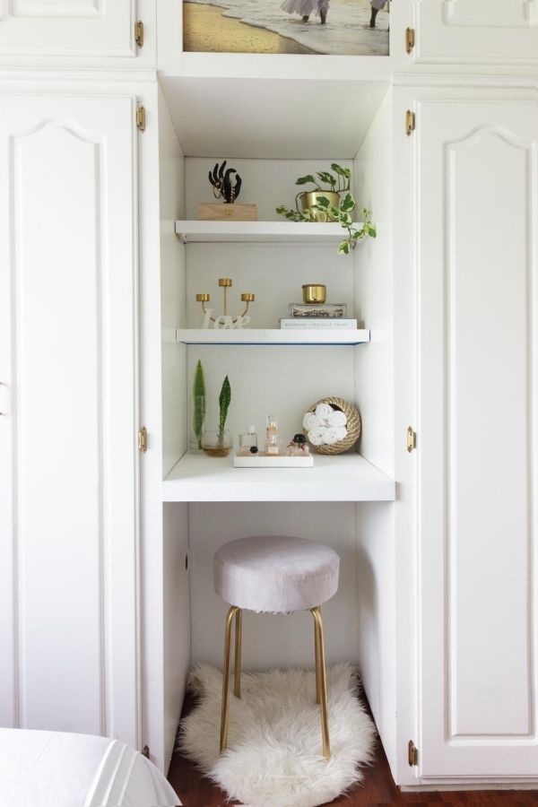 vanity nook with floating shelves