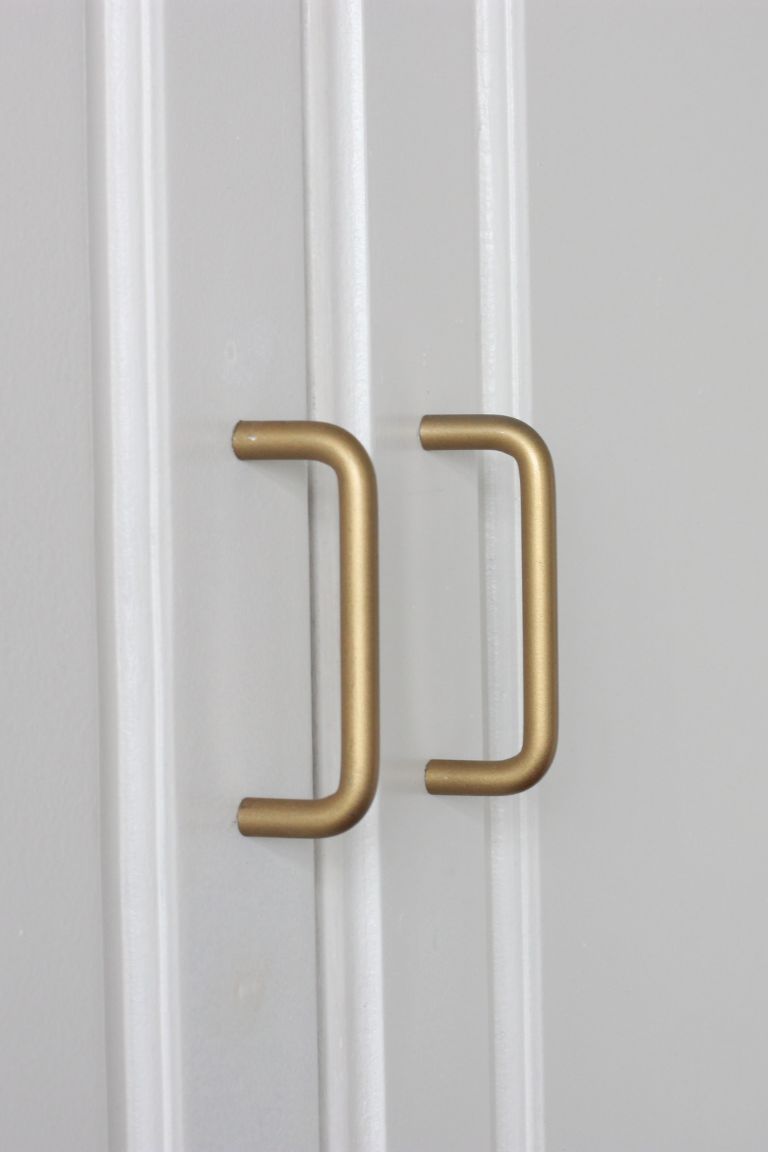 Cabinet handles spraypainted gold